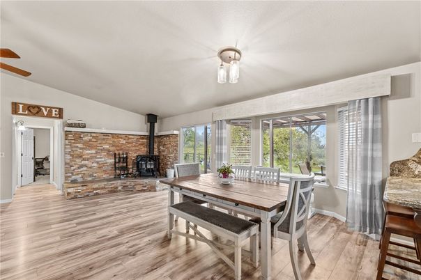 Dining room, Fireplace, Interior, Stone Walls, Wood Texture Flooring