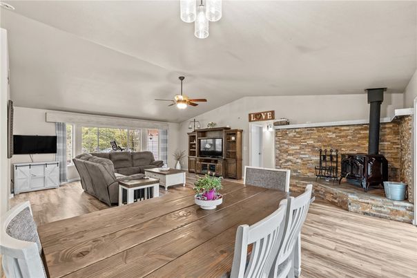 Dining room, Fireplace, Interior, Living room, Stone Walls, Wood Texture Flooring