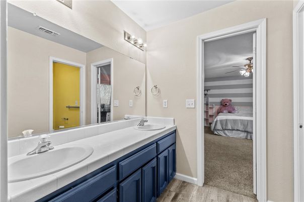 Bathroom, Bedroom, Dual Sink Vanities, Interior, Tile Countertops, Wood Texture Flooring