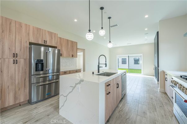 Interior, Kitchen, Pendant Lights, Recessed Lighting, Stainless Steel Appliances, Wood Texture Flooring