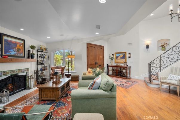 Dining room, Fireplace, Interior, Living room, Recessed Lighting, Wood Texture Flooring