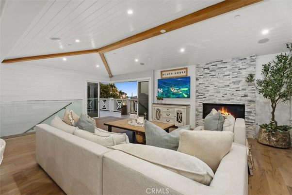 Fireplace, Interior, Living room, Recessed Lighting, Stone Walls, Wooden Beams, Wood Texture Flooring