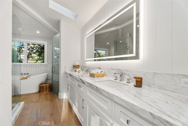 Bathroom, Dual Sink Vanities, Interior, Recessed Lighting, Wood Texture Flooring