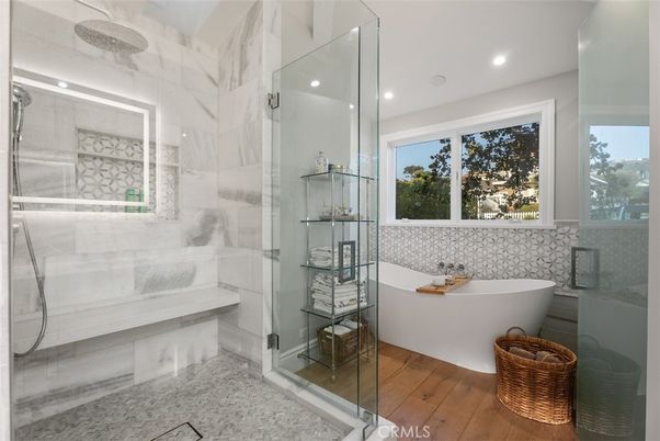 Bathroom, Free Standing Baths, Glass Shower, Interior, Recessed Lighting, Wood Texture Flooring
