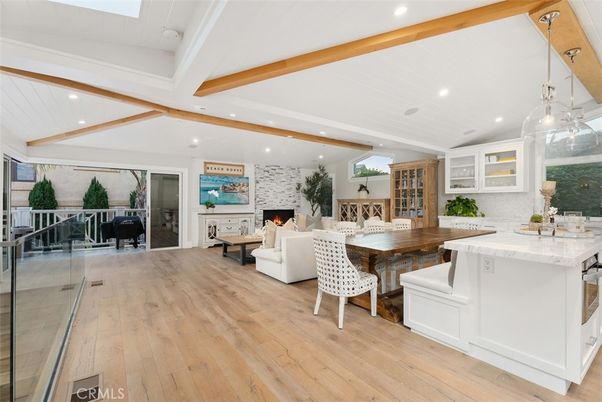 Dining room, Fireplace, Interior, Living room, Pendant Lights, Recessed Lighting, Wooden Beams, Wood Texture Flooring