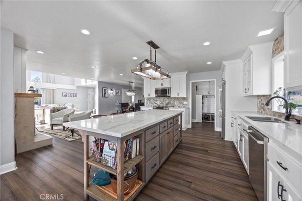 Dining room, Interior, Kitchen, Living room, Pendant Lights, Recessed Lighting, Stainless Steel Appliances, Wood Texture Flooring
