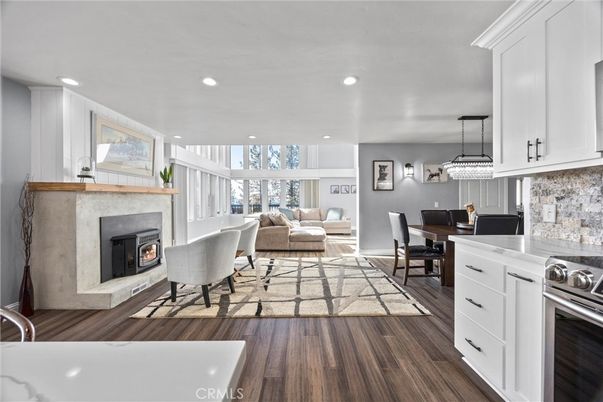Dining room, Fireplace, Interior, Kitchen, Living room, Pendant Lights, Recessed Lighting, Wood Texture Flooring