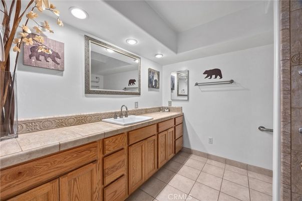 Bathroom, Dual Sink Vanities, Interior, Recessed Lighting, Tile Countertops