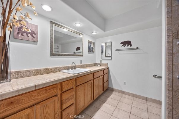 Bathroom, Dual Sink Vanities, Interior, Recessed Lighting, Tile Countertops