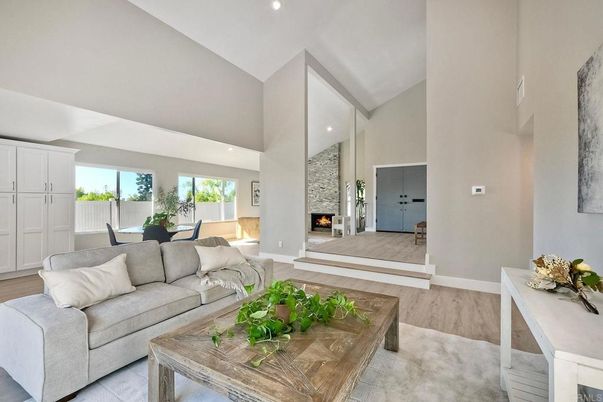 Dining room, Fireplace, Interior, Living room, Recessed Lighting, Wood Texture Flooring
