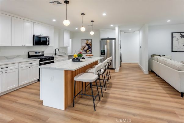 Interior, Kitchen, Pendant Lights, Recessed Lighting, Stainless Steel Appliances, Wood Texture Flooring