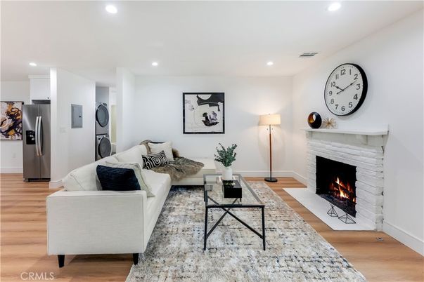 Fireplace, Interior, Living room, Recessed Lighting, Wood Texture Flooring