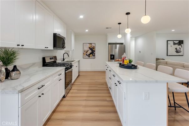 Interior, Kitchen, Pendant Lights, Recessed Lighting, Stainless Steel Appliances, Wood Texture Flooring