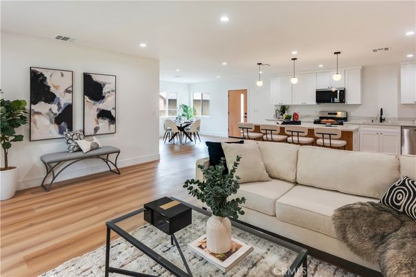 Dining room, Interior, Kitchen, Living room, Pendant Lights, Recessed Lighting, Stainless Steel Appliances, Wood Texture Flooring