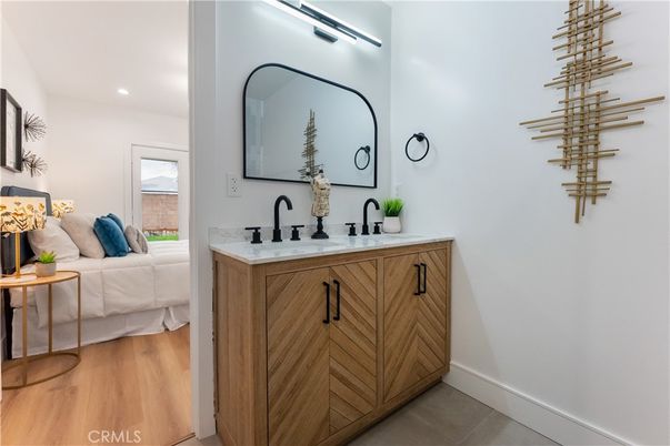 Bathroom, Dual Sink Vanities, Interior, Recessed Lighting, Wood Texture Flooring