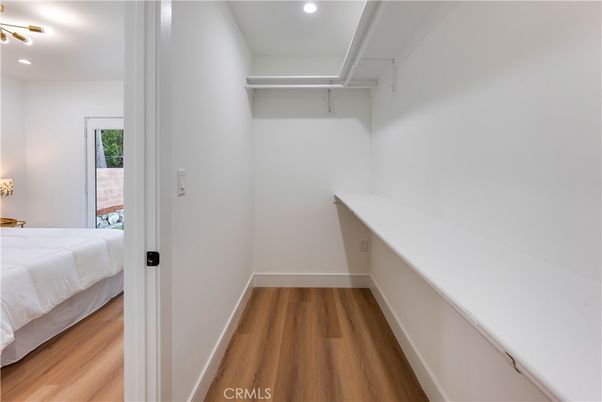 Bedroom, Interior, Recessed Lighting, Walk-in Closets, Wood Texture Flooring