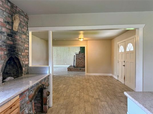 Empty room, Fireplace, Interior, Stone Walls, Wood Texture Flooring