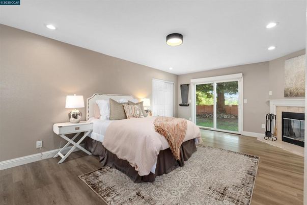 Bedroom, Fireplace, Interior, Recessed Lighting, Wood Texture Flooring