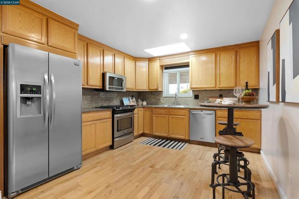 Interior, Kitchen, Recessed Lighting, Stainless Steel Appliances, Wood Texture Flooring