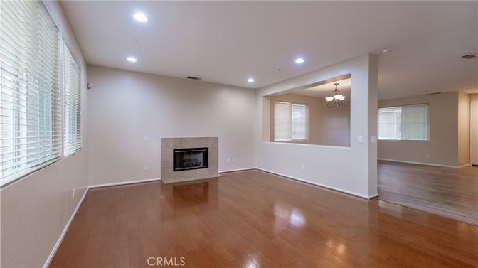 Chandelier, Empty room, Fireplace, Interior, Recessed Lighting, Wood Texture Flooring