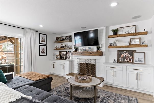 Fireplace, Interior, Living room, Recessed Lighting, Wood Texture Flooring