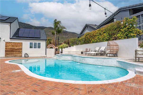 Exterior, Pool, Solar Panels