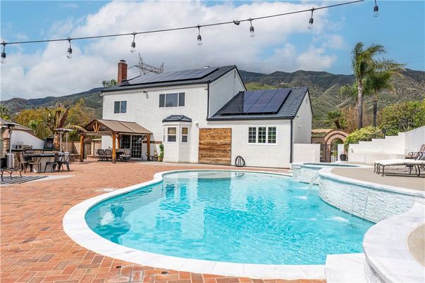 Exterior, Pool, Solar Panels