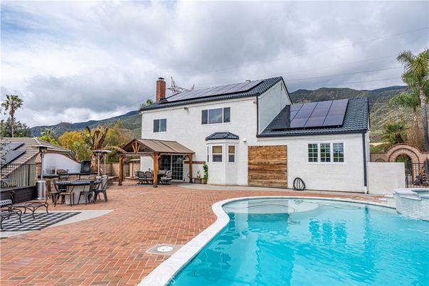 Exterior, Pool, Solar Panels