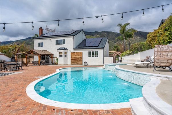 Exterior, Pool, Solar Panels