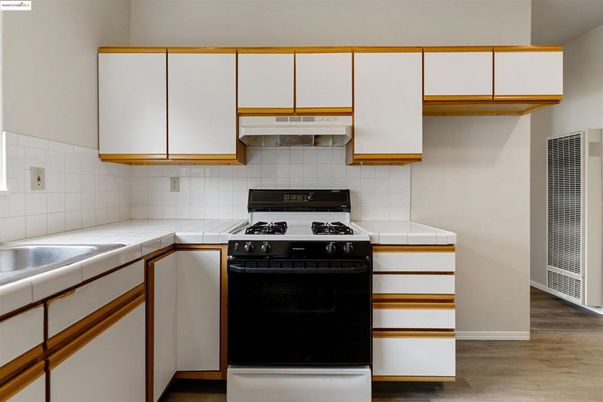 Interior, Kitchen, Tile Countertops, Wood Texture Flooring
