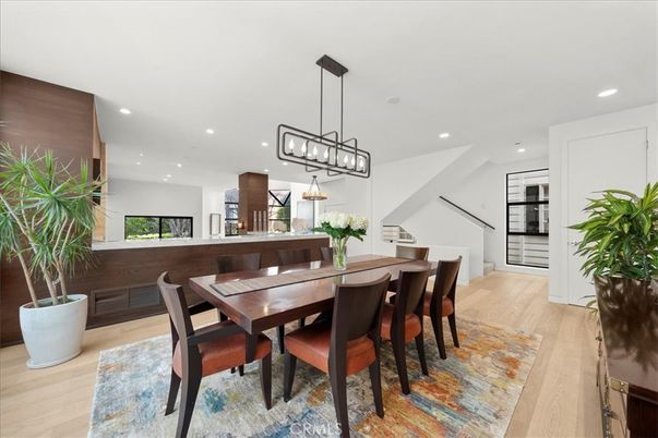 Dining room, Interior, Kitchen, Pendant Lights, Recessed Lighting, Stainless Steel Appliances, Wood Texture Flooring