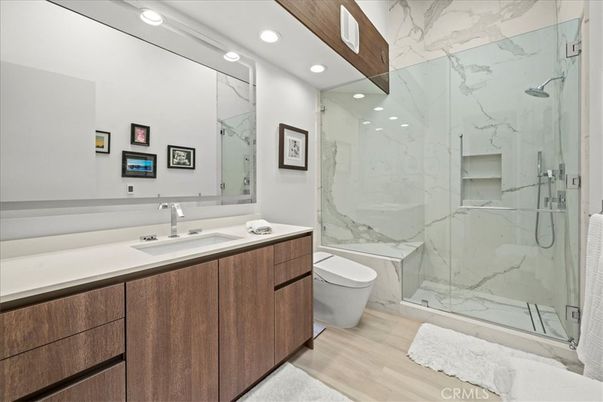 Bathroom, Glass Shower, Interior, Marble Walls, Recessed Lighting, Wood Texture Flooring