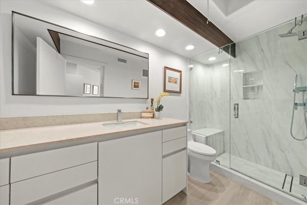 Bathroom, Glass Shower, Interior, Marble Walls, Recessed Lighting, Wood Texture Flooring