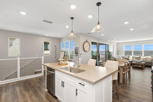 Dining room, Interior, Kitchen, Living room, Pendant Lights, Recessed Lighting, Stainless Steel Appliances, Wood Texture Flooring