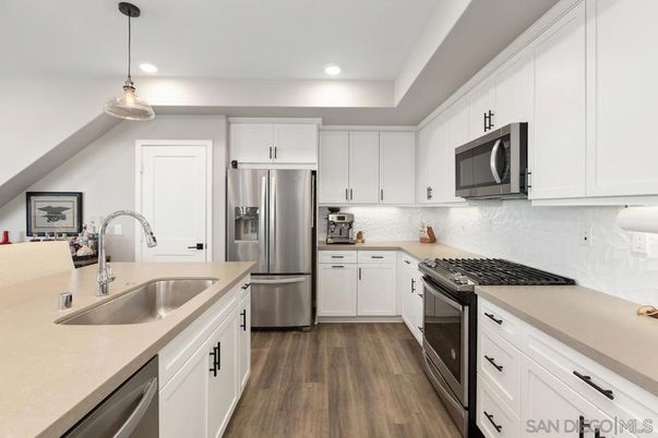 Interior, Kitchen, Pendant Lights, Recessed Lighting, Stainless Steel Appliances, Wood Texture Flooring