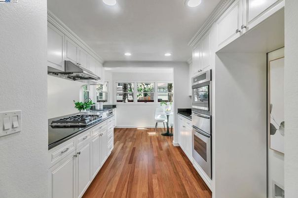 Interior, Kitchen, Recessed Lighting, Stainless Steel Appliances, Wood Texture Flooring