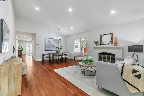 Dining room, Fireplace, Interior, Living room, Pendant Lights, Recessed Lighting, Wood Texture Flooring