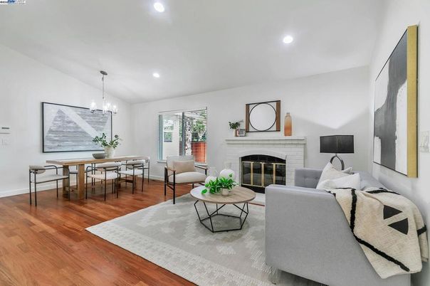 Dining room, Fireplace, Interior, Living room, Pendant Lights, Recessed Lighting, Wood Texture Flooring