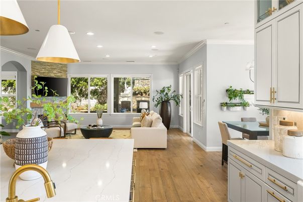 Dining room, Fireplace, Interior, Living room, Pendant Lights, Recessed Lighting, Stone Walls, Wood Texture Flooring