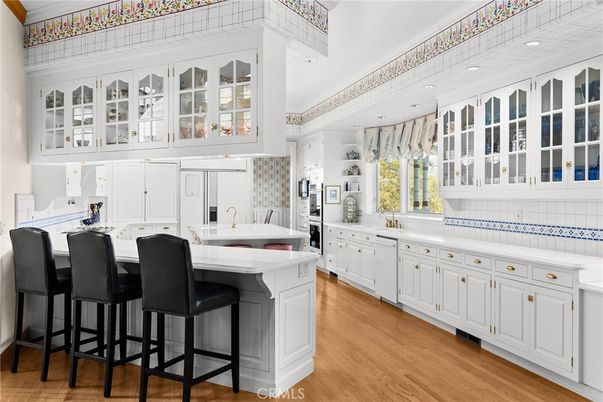 Interior, Kitchen, Recessed Lighting, Tile Countertops, Wood Texture Flooring