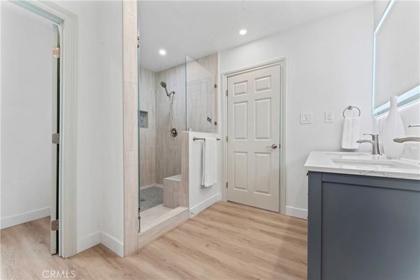 Bathroom, Glass Shower, Interior, Recessed Lighting, Wood Texture Flooring