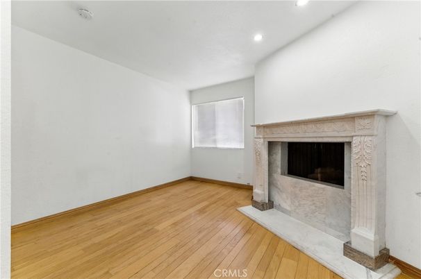 Empty room, Fireplace, Interior, Recessed Lighting, Wood Texture Flooring