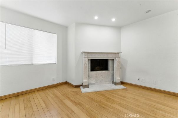 Empty room, Fireplace, Interior, Recessed Lighting, Wood Texture Flooring