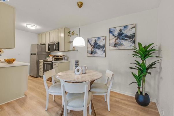 Dining room, Interior, Kitchen, Pendant Lights, Stainless Steel Appliances, Wood Texture Flooring