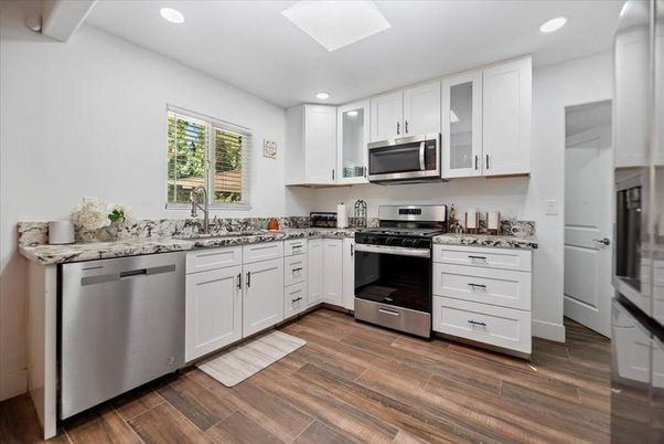 Interior, Kitchen, Recessed Lighting, Stainless Steel Appliances, Wood Texture Flooring