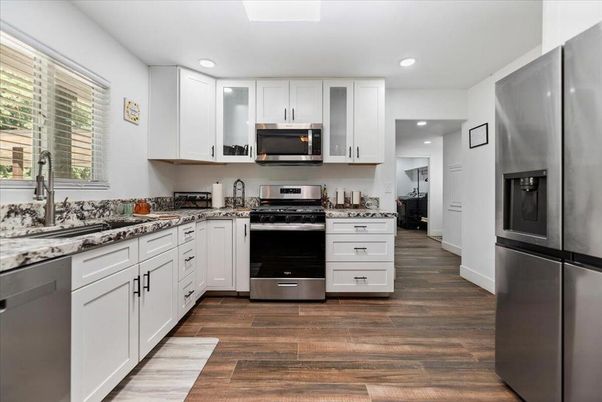 Interior, Kitchen, Recessed Lighting, Stainless Steel Appliances, Wood Texture Flooring