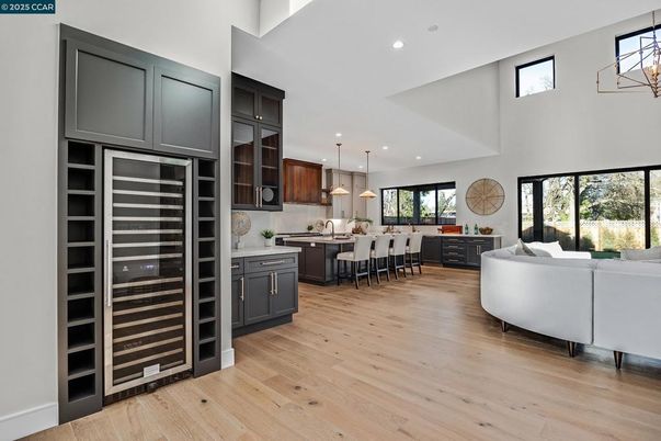 Dining room, Interior, Kitchen, Living room, Pendant Lights, Recessed Lighting, Stainless Steel Appliances, Wood Texture Flooring