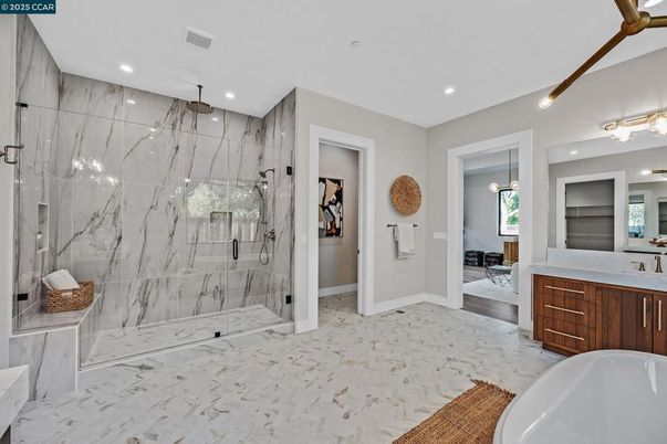 Bathroom, Free Standing Baths, Glass Shower, Interior, Marble, Marble Walls, Recessed Lighting