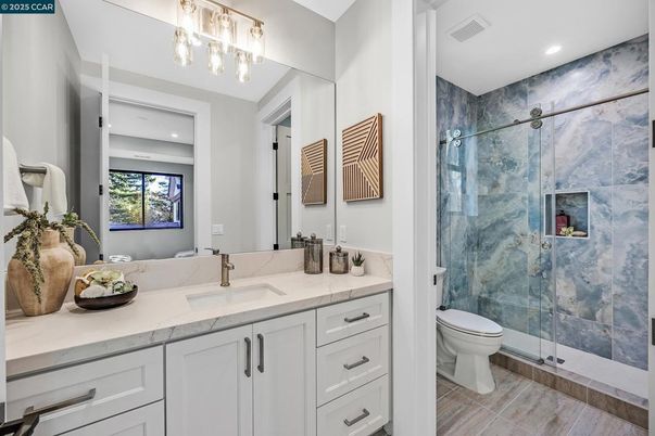 Bathroom, Glass Shower, Interior, Marble Walls, Recessed Lighting, Wood Texture Flooring