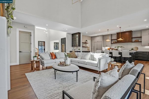 Dining room, Interior, Kitchen, Living room, Pendant Lights, Recessed Lighting, Stainless Steel Appliances, Wood Texture Flooring